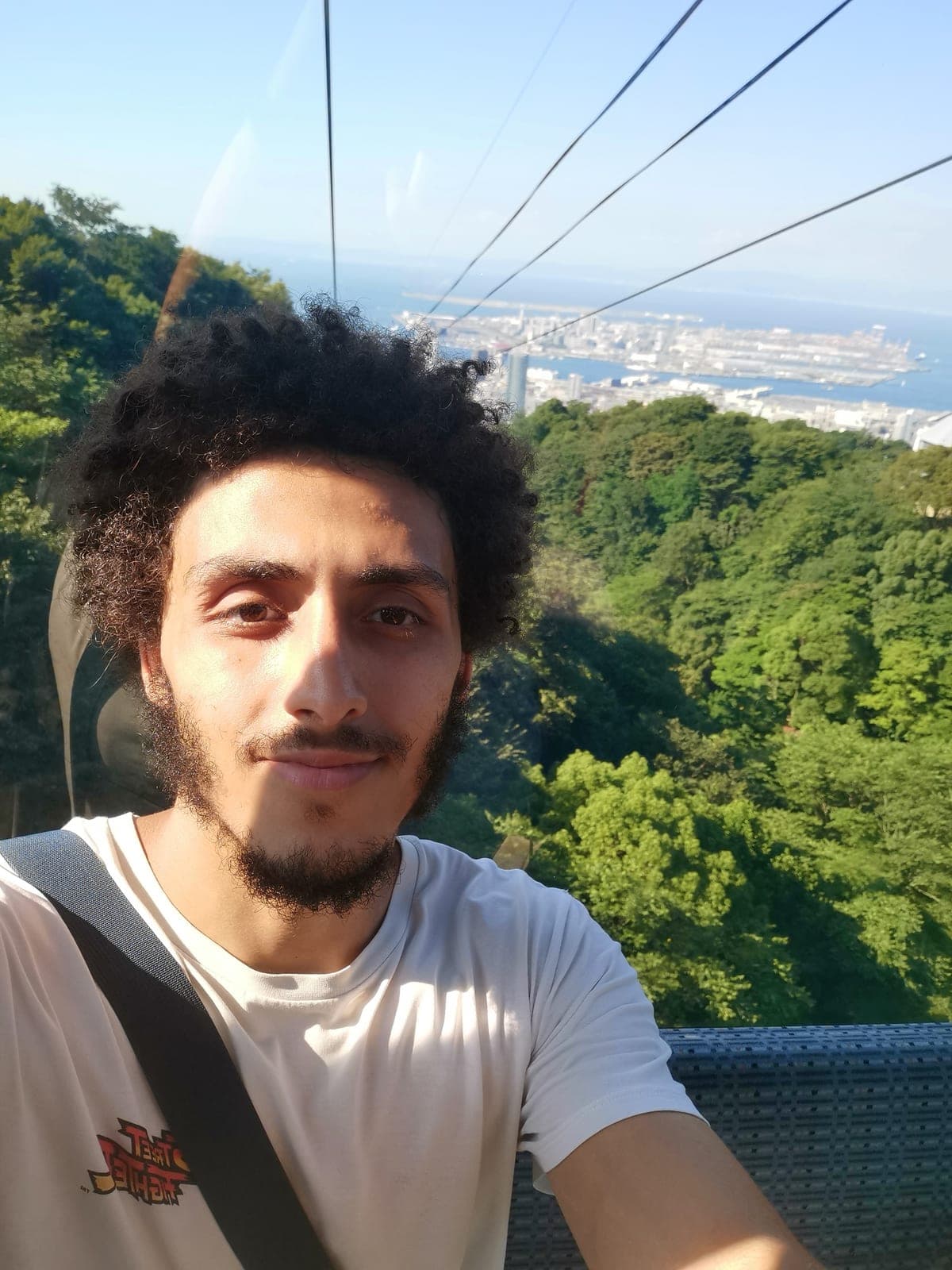 3:57 pm. The ropeway up to the herb gardens, Kobe behind me.