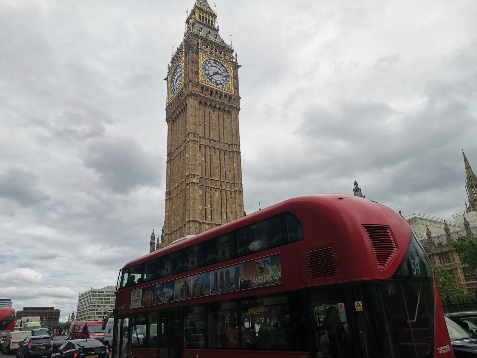 2:37 pm. Big Ben, with a red bus passing right on cue.