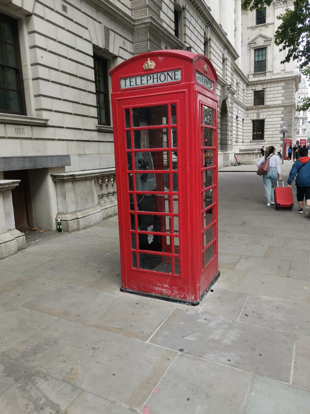 A red phone box, and Big Ben at the end of Whitehall. Hard to get more London.