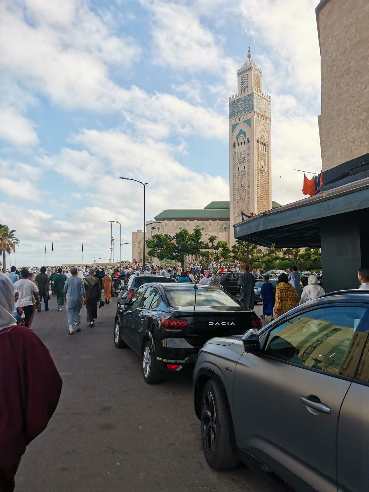 Monday, 7:48 am. Eid morning, crowds on their way to the prayer.