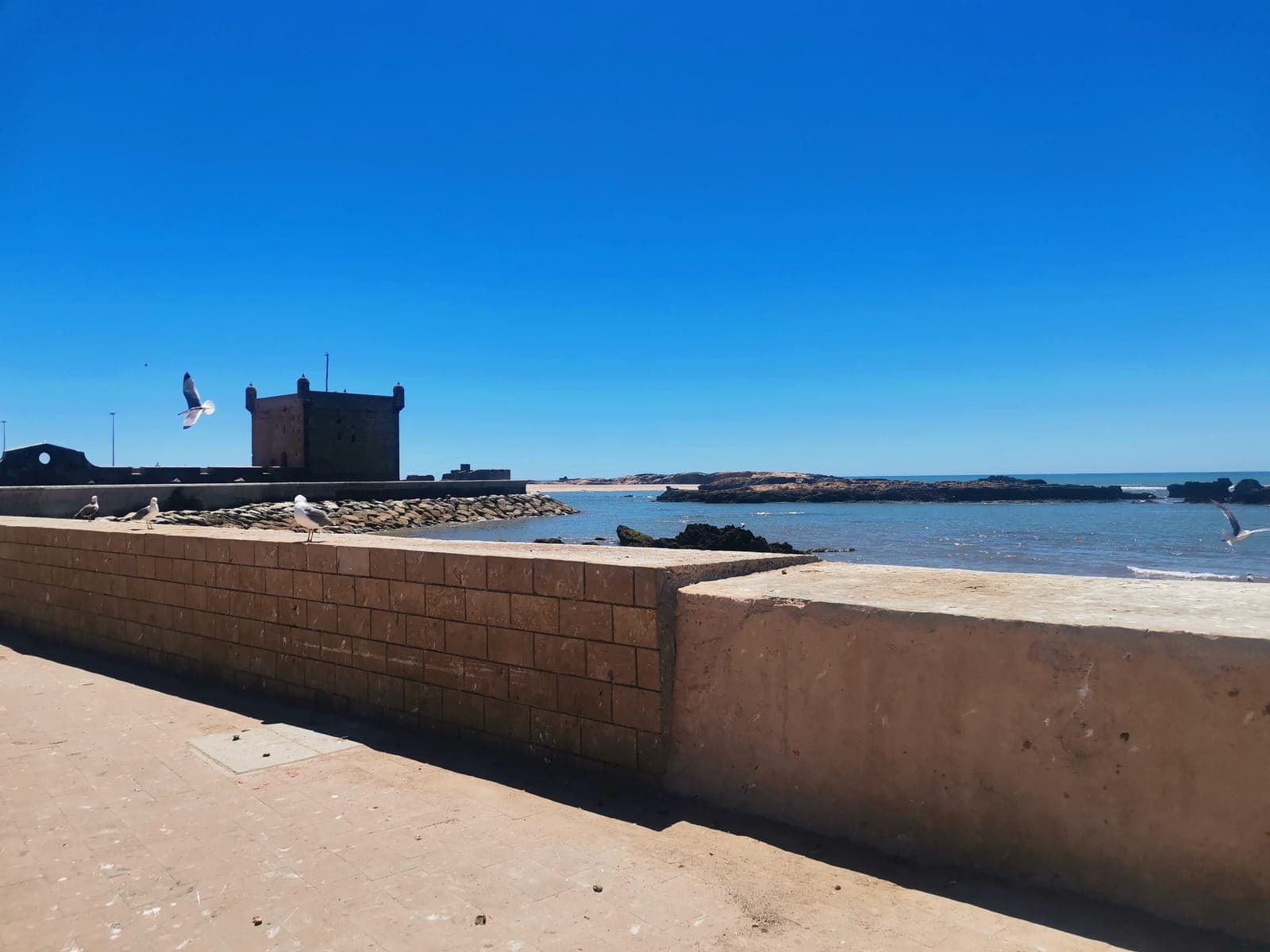 3:16 pm. The ramparts, the fort at the end.