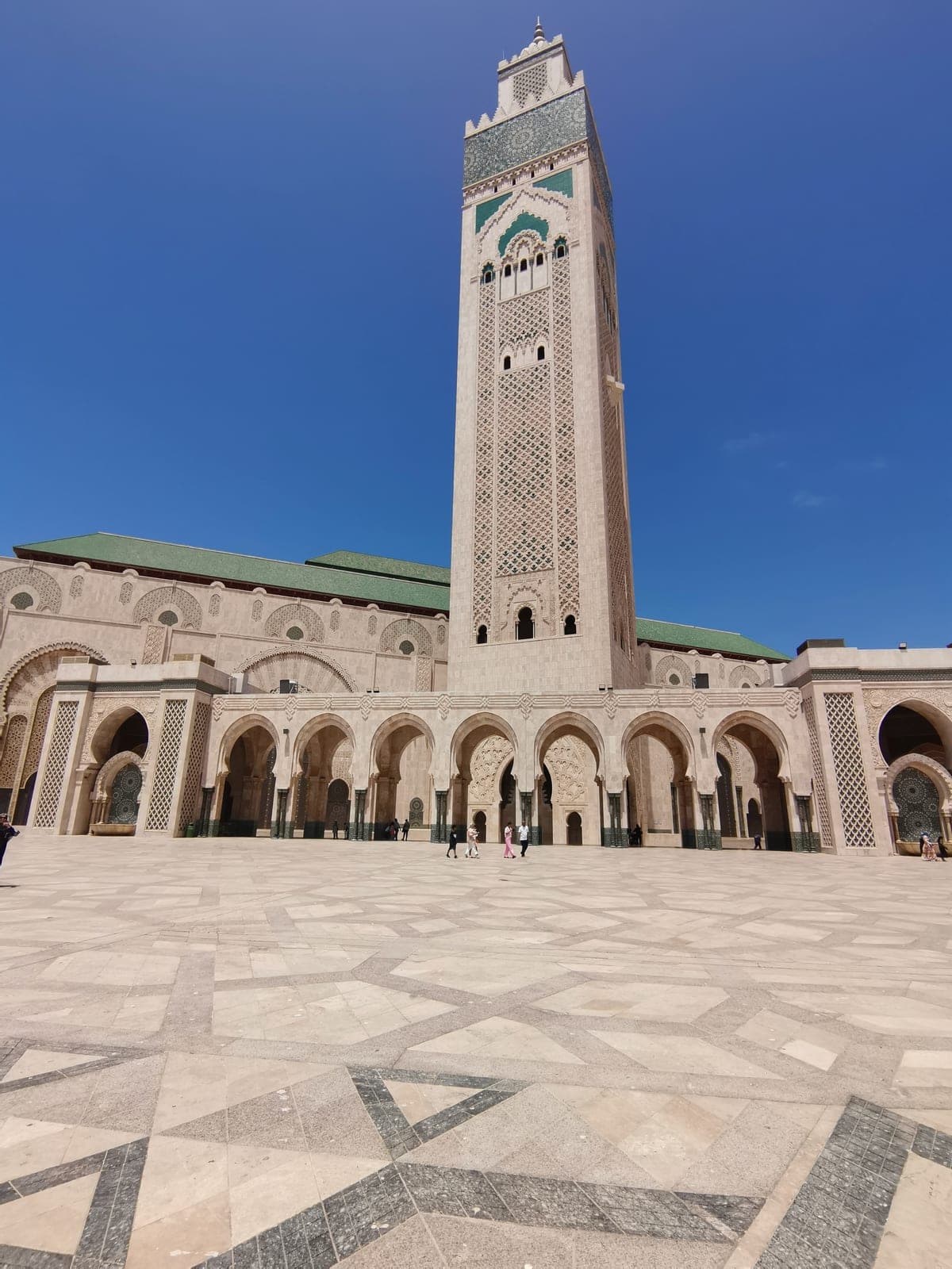 Saturday, 2:15 pm. The Hassan II Mosque, the minaret from its foot.