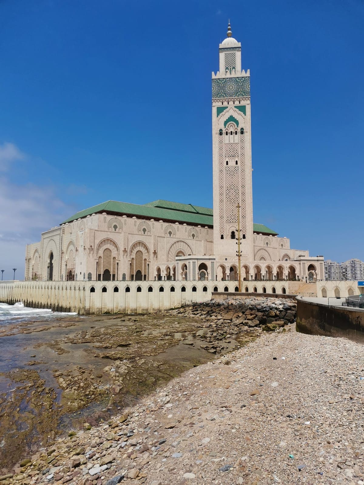 The prayer hall, then the minaret above the ocean.