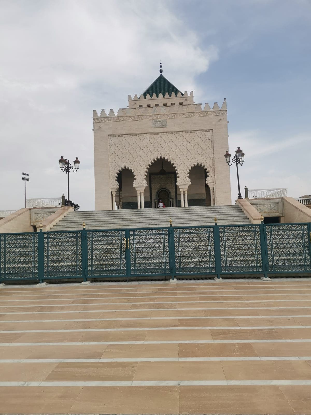 5:57 pm. The Hassan Tower, then the Mohammed V Mausoleum right across.