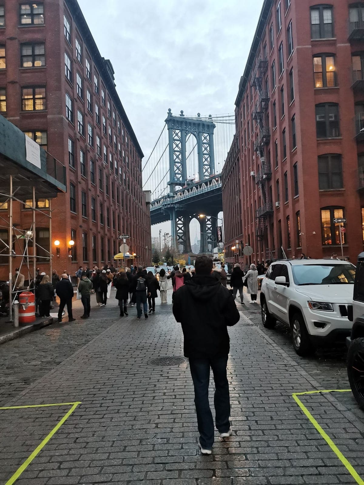 4:26 pm. Washington Street in DUMBO, the Manhattan Bridge at the end. Then me, in the middle of it.