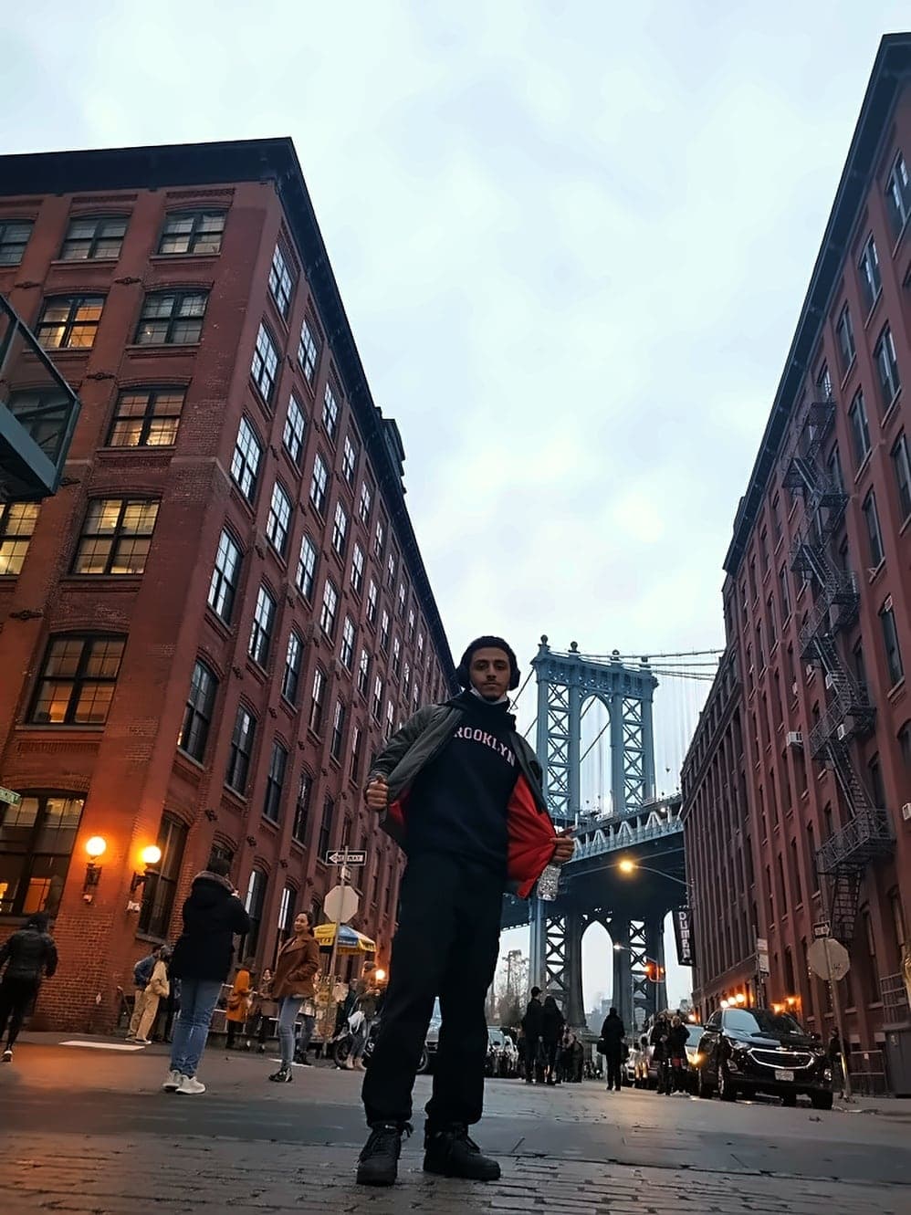 4:26 pm. Washington Street in DUMBO, the Manhattan Bridge at the end. Then me, in the middle of it.