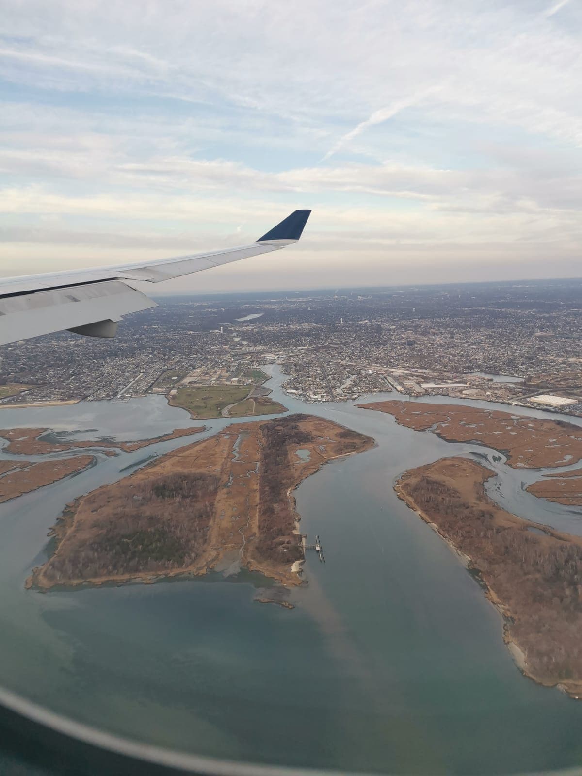 2:45 pm, Jamaica Bay under the wing. Then the welcome sign.