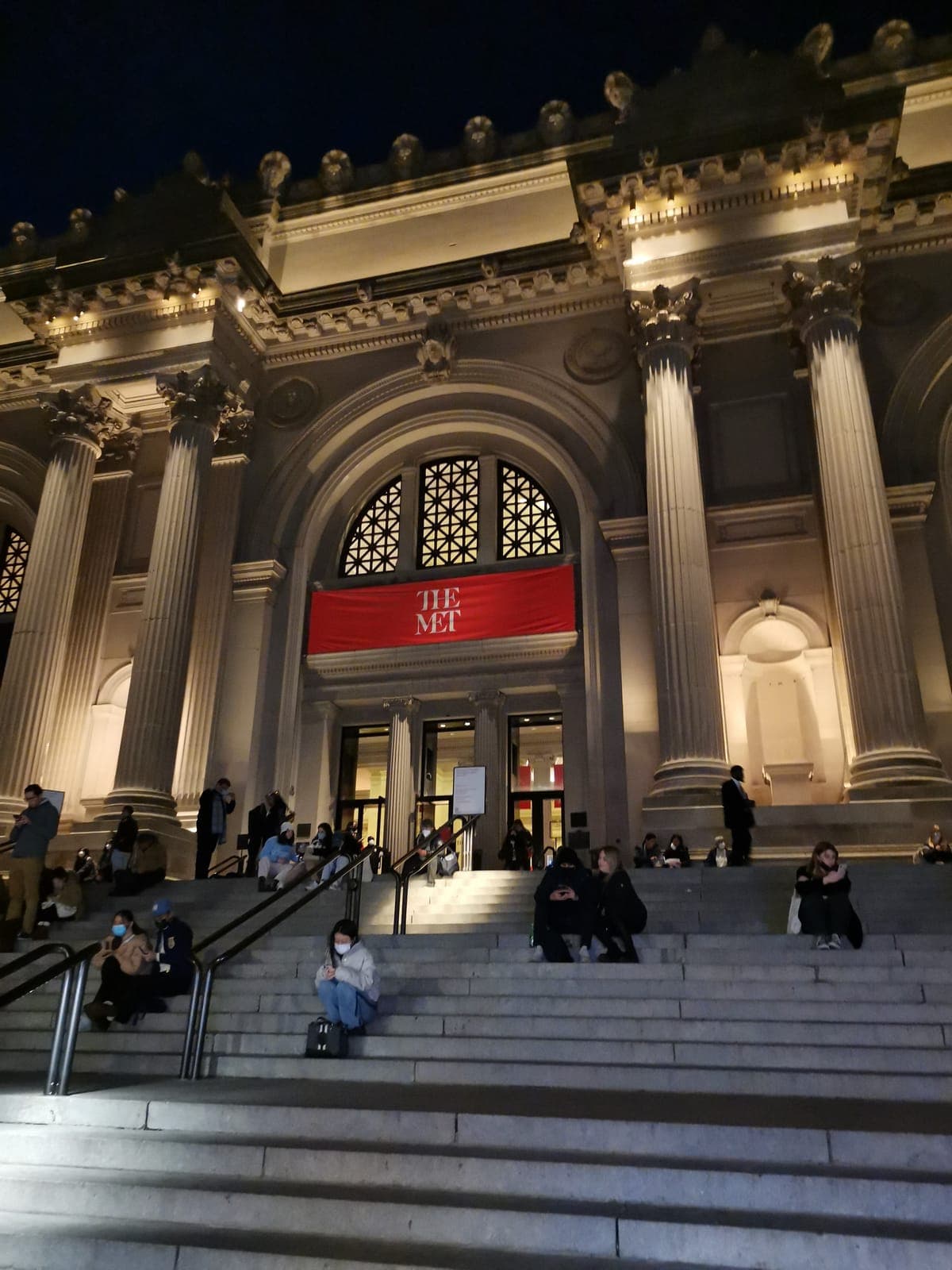The Met at nightfall, then steam rising from the street.