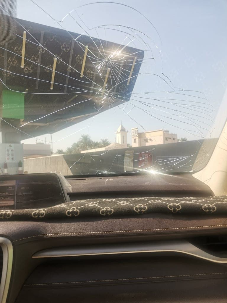 On the way, in this taxi. Yes, that is the windscreen.